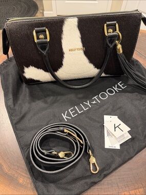 Kelly Tooke- Black & White Haircalf Satchel w/tassel & shoulder strap.